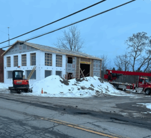 New construction building in winter during framing stage in Kingston Ontario, photographed for Equinox Home Inspection Services, Rick Conley, certified home inspector.